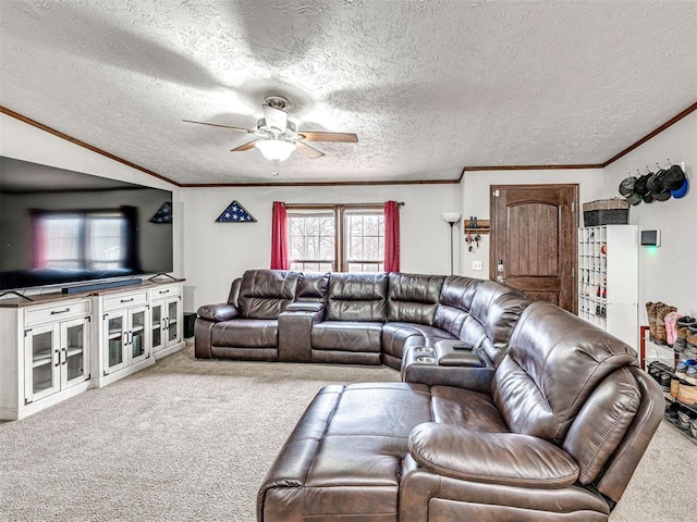 carpeted living room with crown molding, a textured ceiling, and ceiling fan