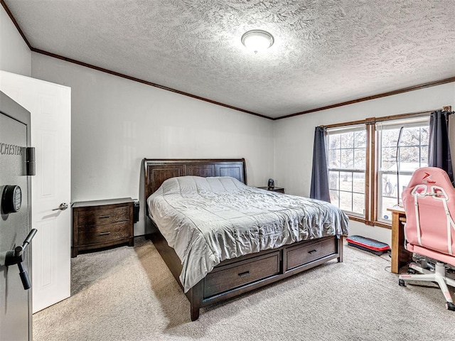 carpeted bedroom with a textured ceiling and ornamental molding