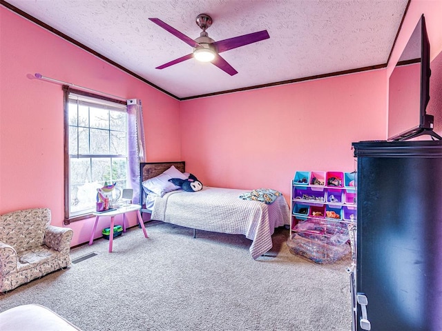 bedroom with visible vents, vaulted ceiling, a textured ceiling, and carpet flooring