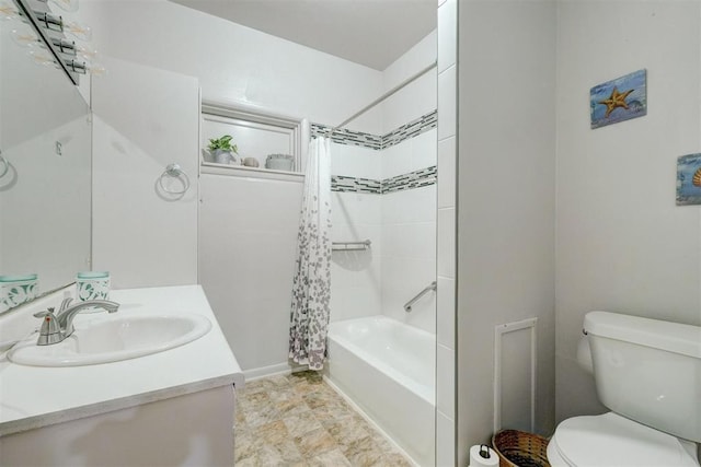 full bathroom with shower / bath combo, vanity, and toilet