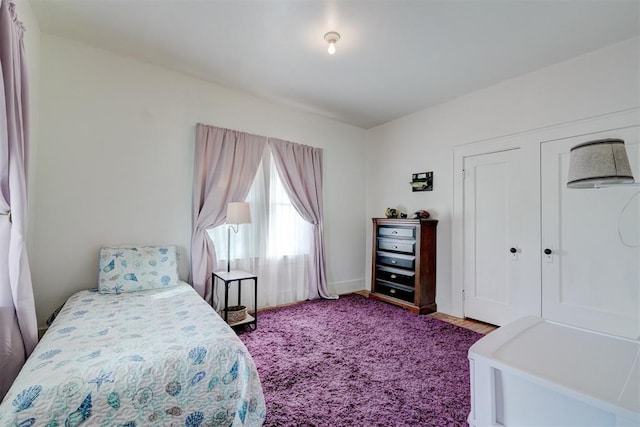 bedroom featuring wood finished floors