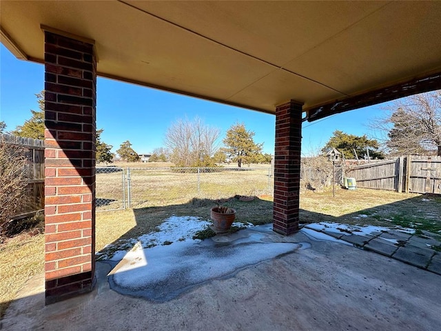 view of patio / terrace featuring a fenced backyard and a gate