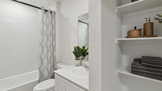 bathroom featuring shower / bath combo with shower curtain, vanity, and toilet