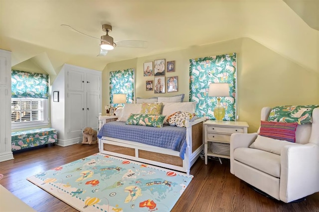 bedroom featuring dark wood-style floors and a ceiling fan