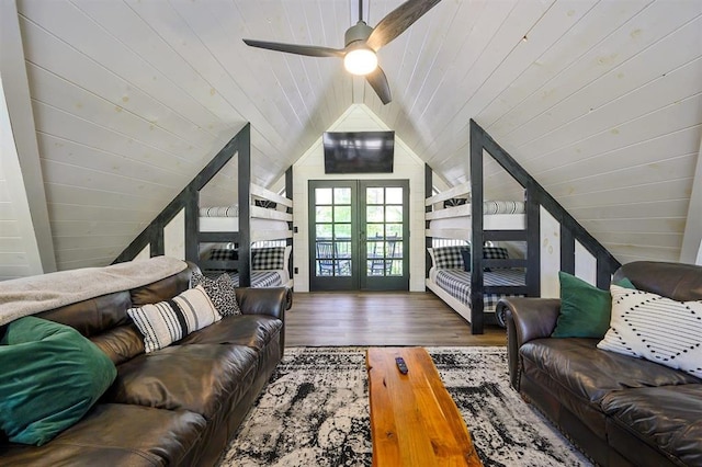 living room with vaulted ceiling, french doors, wooden ceiling, and wood finished floors