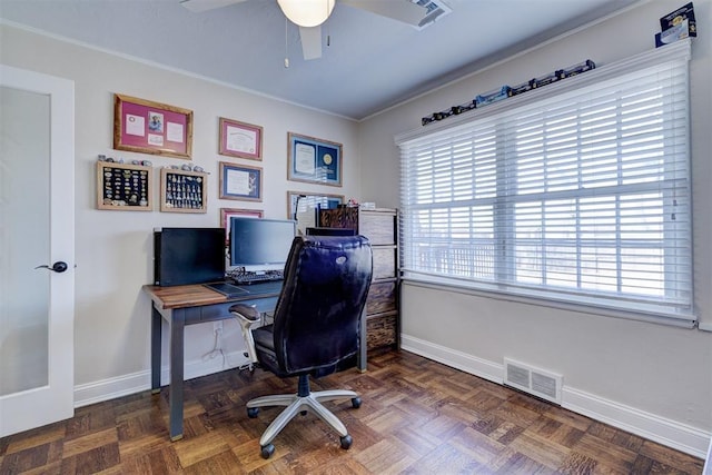 office with visible vents, ceiling fan, and baseboards