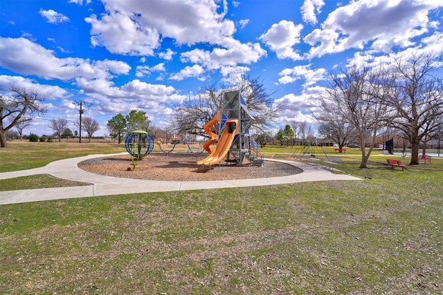 community play area with a lawn