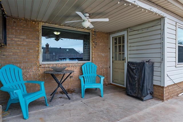 view of patio featuring ceiling fan