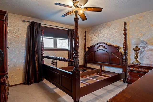 bedroom featuring a textured ceiling, baseboards, carpet, and wallpapered walls