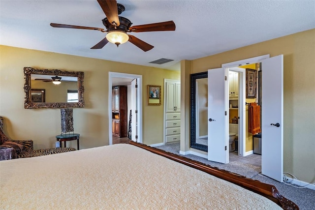 unfurnished bedroom with ceiling fan, carpet, visible vents, and baseboards