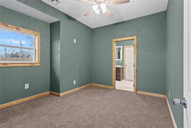 106 N Dewey St, Corn, OK 73024 - carpeted empty room featuring baseboards, visible vents, and a ceiling fan
