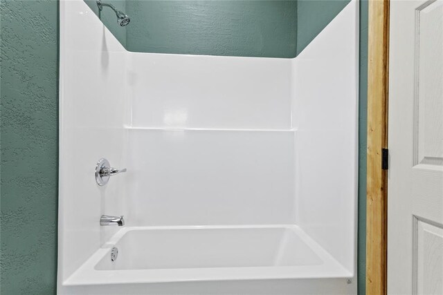 106 N Dewey St, Corn, OK 73024 - full bath with a textured wall and shower / washtub combination