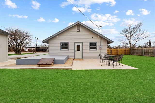 106 N Dewey St, Corn, OK 73024 - rear view of property featuring fence and a lawn