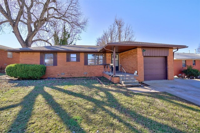 single story home with crawl space, an attached garage, a front lawn, and brick siding