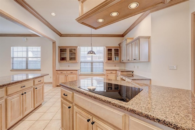 kitchen featuring ornamental molding, light brown cabinetry, black electric stovetop, and glass insert cabinets