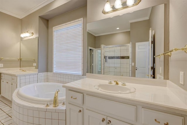 bathroom featuring tile patterned flooring, a garden tub, vanity, ornamental molding, and a tile shower