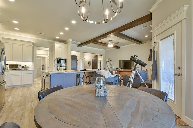 dining area with light wood-style floors, recessed lighting, beam ceiling, and ceiling fan with notable chandelier