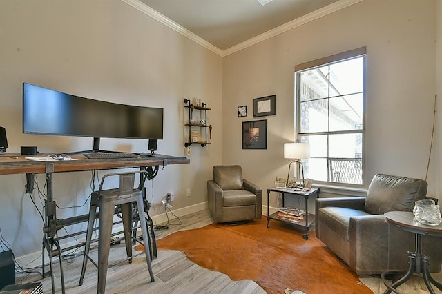 office space featuring ornamental molding, wood finished floors, and baseboards