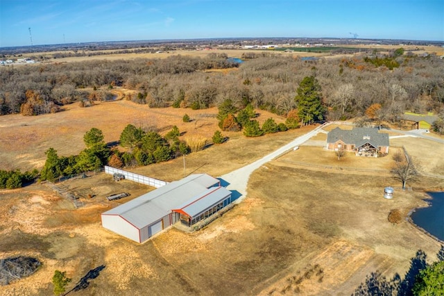 birds eye view of property with a rural view