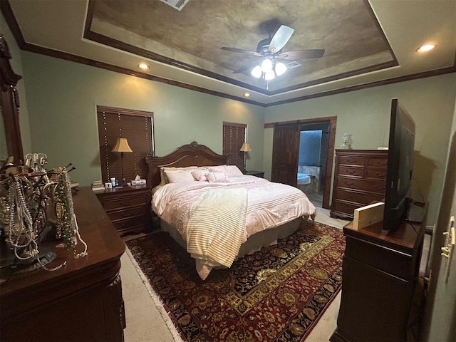 bedroom featuring ceiling fan, a tray ceiling, recessed lighting, and crown molding