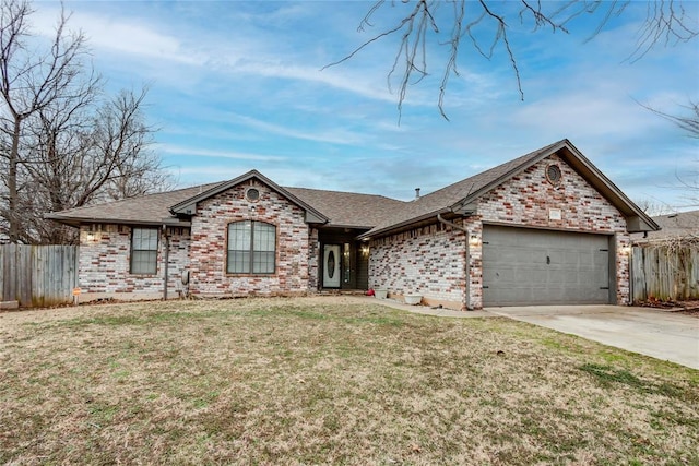 ranch-style home with a garage, fence, concrete driveway, and brick siding