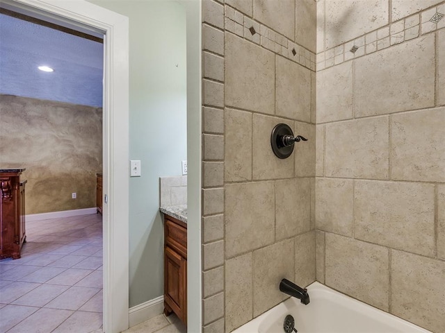 full bath featuring shower / bathtub combination, vanity, and baseboards