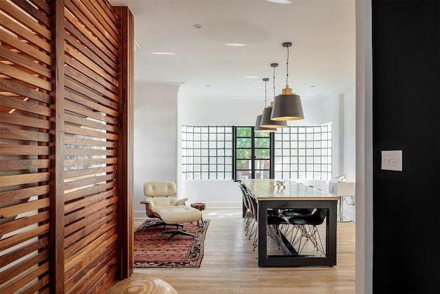 dining room with wood finished floors and baseboards