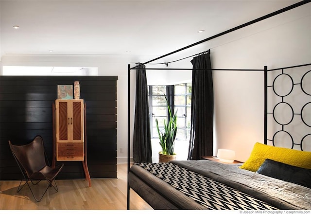 bedroom featuring light wood-style flooring