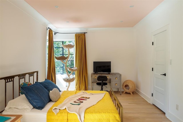 bedroom with light wood-type flooring