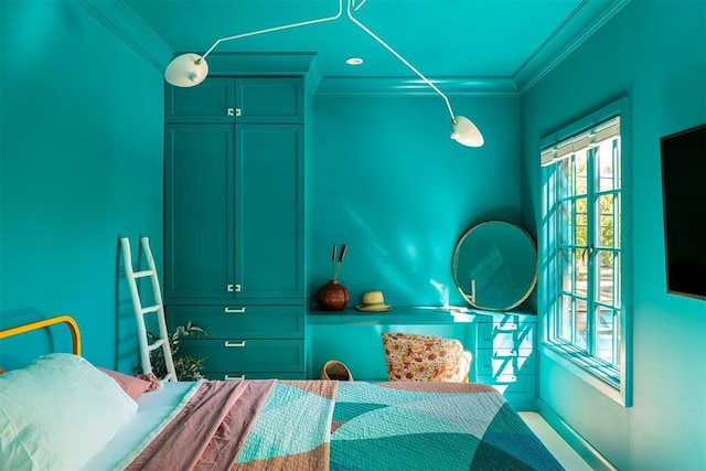 bedroom featuring crown molding