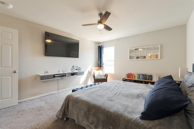 bedroom featuring a ceiling fan, baseboards, and carpet flooring