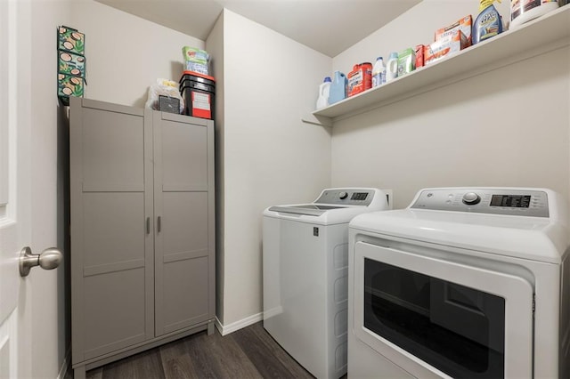 laundry room with washer and dryer, laundry area, baseboards, and dark wood-style flooring