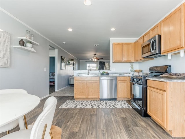 kitchen with stainless steel appliances, a peninsula, light brown cabinets, and crown molding