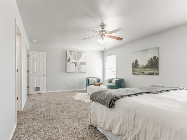 bedroom with carpet floors, ceiling fan, and baseboards