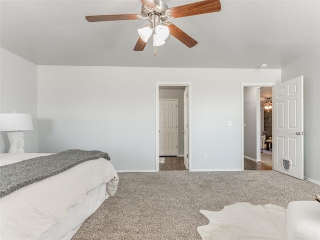 bedroom featuring carpet, a ceiling fan, and baseboards