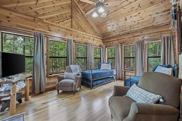 bedroom featuring high vaulted ceiling, wooden ceiling, multiple windows, and light wood-style flooring