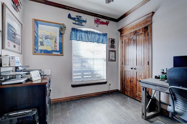 office space with baseboards, wood finished floors, and crown molding