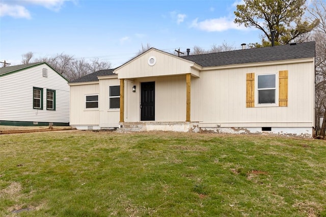 view of front of home with crawl space, a front lawn, and roof with shingles