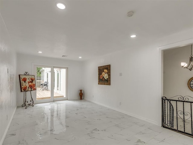 unfurnished room with marble finish floor, baseboards, an inviting chandelier, and recessed lighting