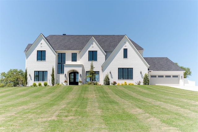 2909 High View Dr, Arcadia, OK 73007 - view of front of property featuring a garage, a front yard, and concrete driveway