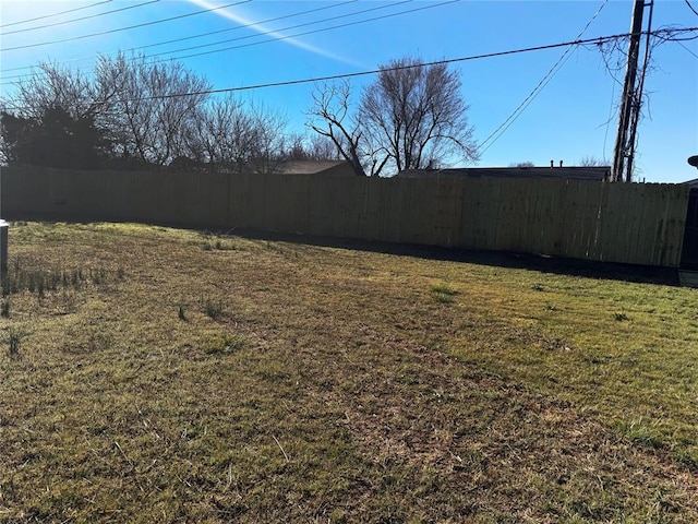 view of yard with fence