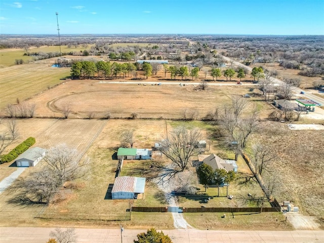 birds eye view of property with a rural view