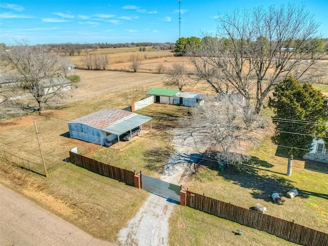 birds eye view of property with a rural view