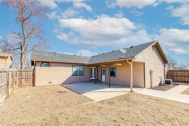 back of house with a fenced backyard, cooling unit, a ceiling fan, and a patio