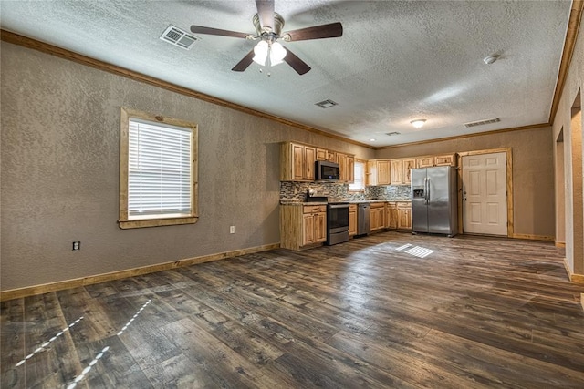 kitchen featuring visible vents, appliances with stainless steel finishes, dark wood-style flooring, and ornamental molding