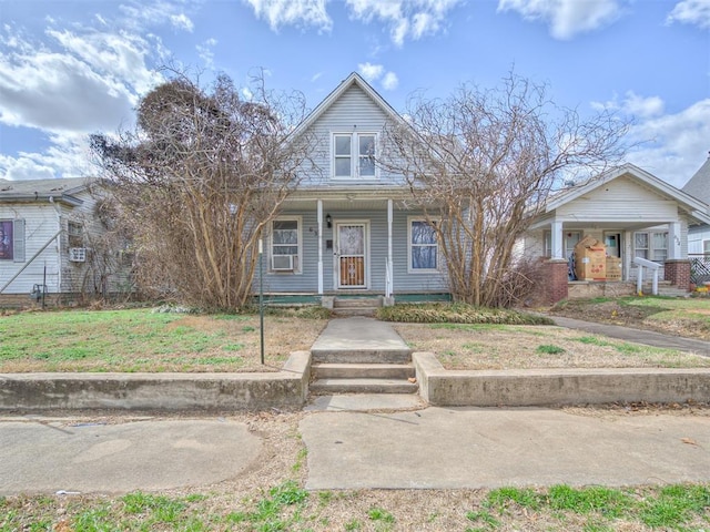 bungalow-style home with a porch