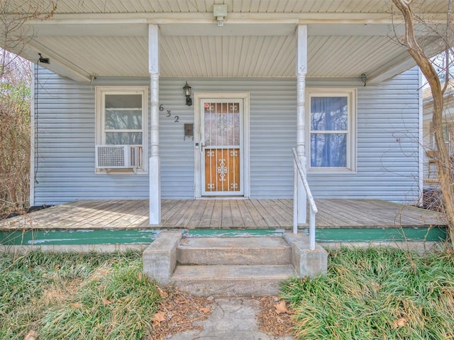 doorway to property with a porch