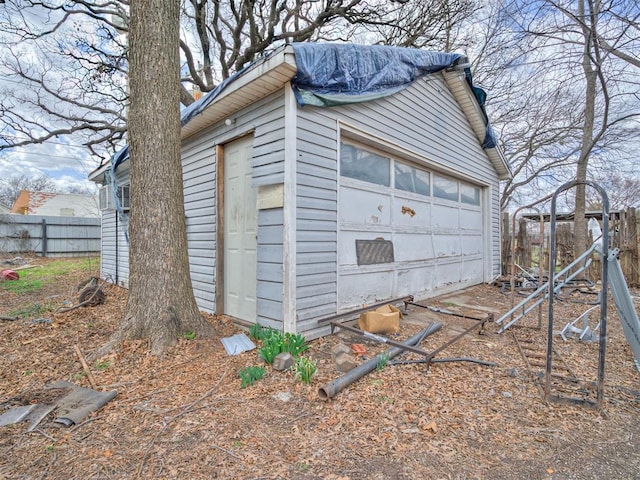 detached garage with fence