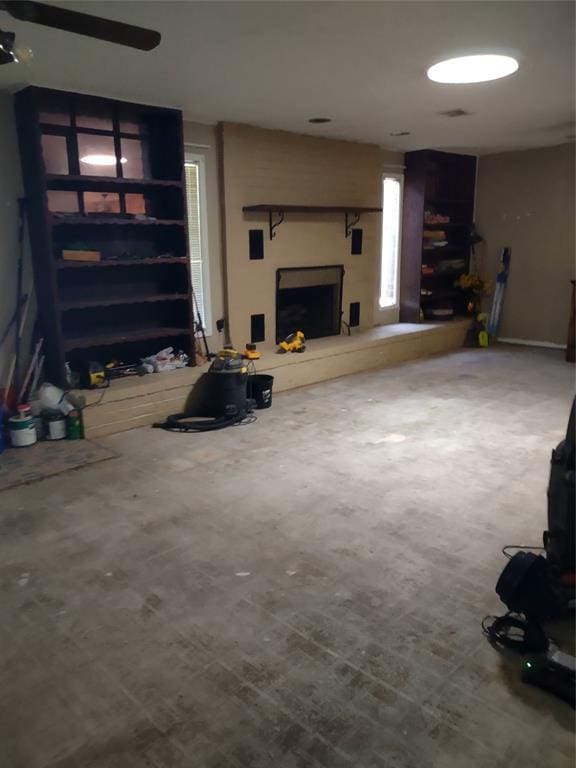 living area featuring a fireplace