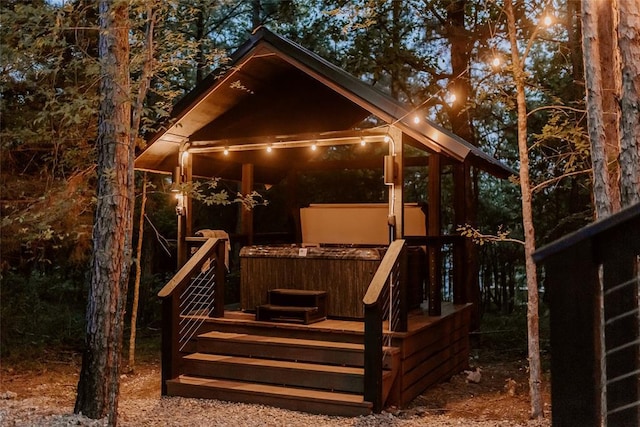 exterior space featuring a hot tub